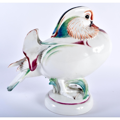 162 - AN UNUSUAL LARGE MEISSEN PORCELAIN FIGURE OF A BIRD modelled with brightly painted enamels, standing... 