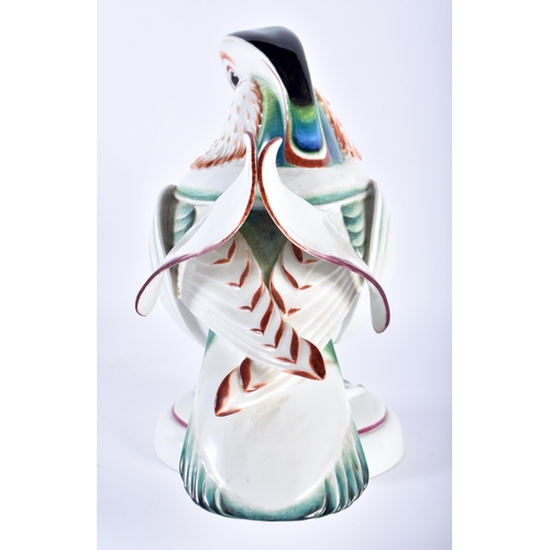 162 - AN UNUSUAL LARGE MEISSEN PORCELAIN FIGURE OF A BIRD modelled with brightly painted enamels, standing... 