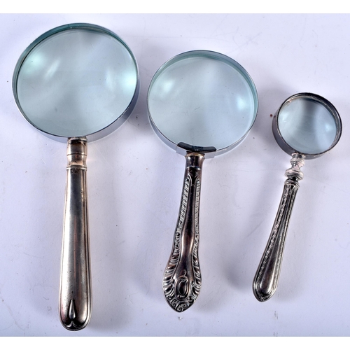 183 - Three Silver Handled Magnifying Glasses.  Hallmarks incl Sheffield 1916 and London 1891.  Largest 21... 