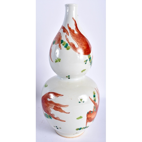 19 - AN UNUSUAL 19TH CENTURY CHINESE GOURD FORM PORCELAIN VASE Qing, painted with goldfish swimming among... 