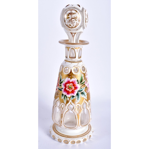 20 - A 19TH CENTURY BOHEMIAN GLASS SCENT BOTTLE AND STOPPER overlaid with white enamel and gilt panels, p... 