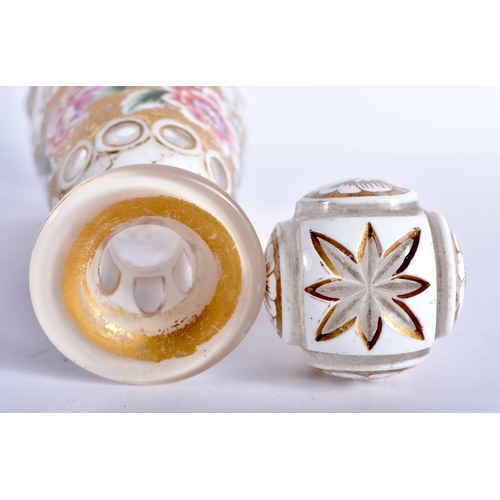 20 - A 19TH CENTURY BOHEMIAN GLASS SCENT BOTTLE AND STOPPER overlaid with white enamel and gilt panels, p... 