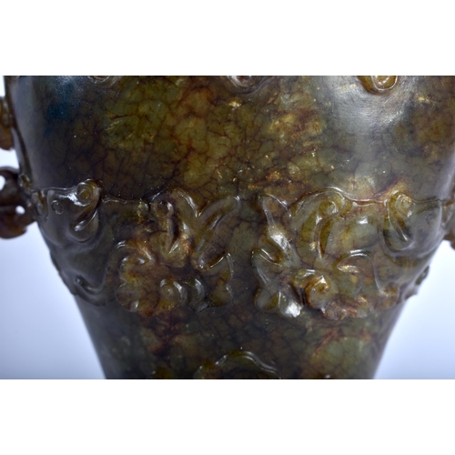 27 - A 19TH CENTURY CHINESE CARVED MUTTON JADE VASE AND COVER Qing, overlaid with opposing dragons.