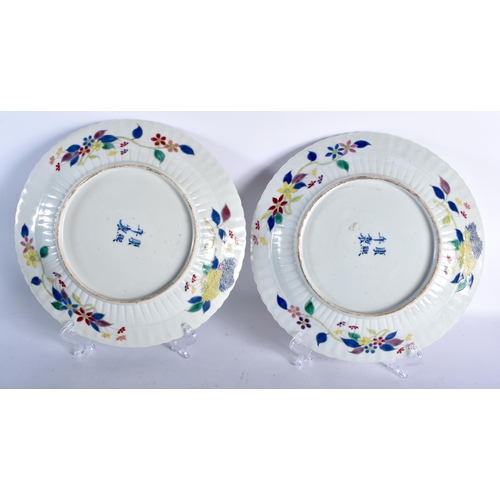 29 - A PAIR OF LATE 19TH CENTURY CHINESE FAMILLE ROSE PORCELAIN RIBBED PLATES Guangxu, bearing Kangxi mar... 