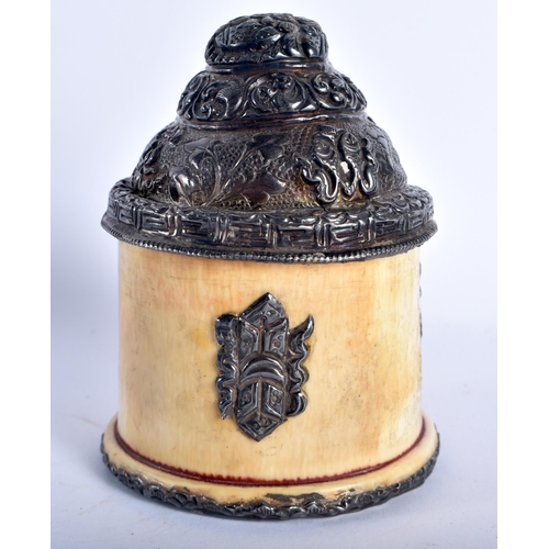 35 - A 19TH CENTURY TIBETAN SILVER MOUNTEE BONE SCHOLARS OBJECT decorated with foliage. 9 cm x 5 cm.