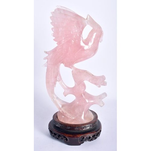 37 - A 19TH CENTURY CHINESE CARVED ROSE QUARTZ FIGURE OF A BIRD Late Qing. 22 cm high.