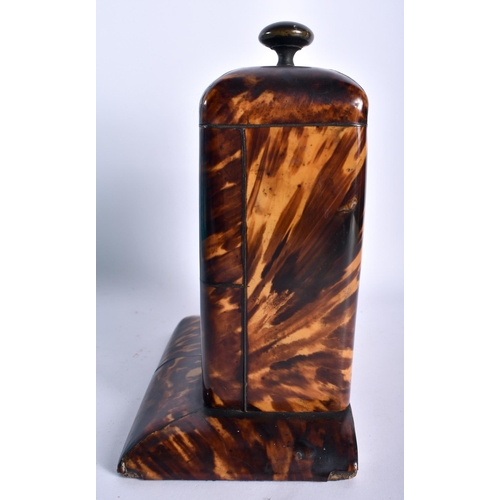 41 - AN UNUSUAL REGENCY CARVED TORTOISESHELL POCKET WATCH HOLDER with large bronze finial, the central bo... 