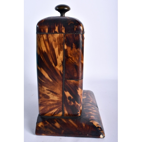 41 - AN UNUSUAL REGENCY CARVED TORTOISESHELL POCKET WATCH HOLDER with large bronze finial, the central bo... 