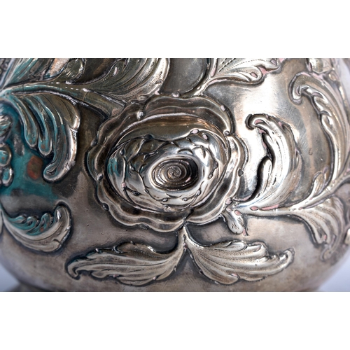 43 - A GOOD GEORGE III SILVER CHOCOLATE POT by Fuller White, decorated in relief with repousse foliage, t... 