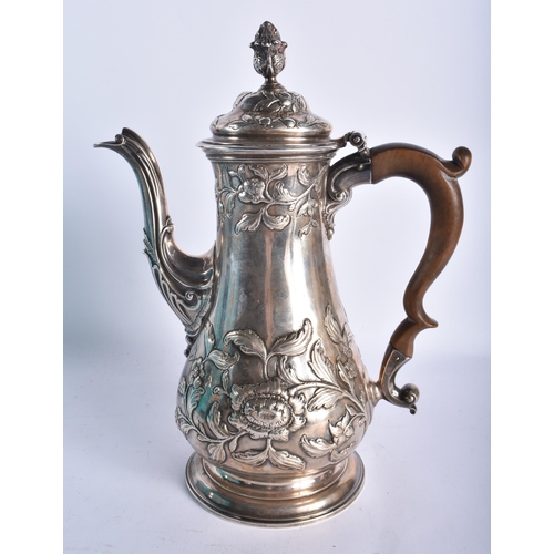 43 - A GOOD GEORGE III SILVER CHOCOLATE POT by Fuller White, decorated in relief with repousse foliage, t... 