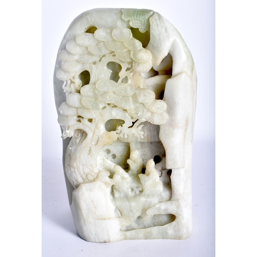 44 - A LARGE EARLY 20TH CENTURY CHINESE CARVED JADEITE MOUNTAIN BOULDER Late Qing/Republic, together with... 