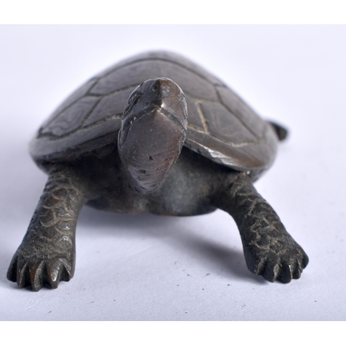 47 - A 19TH CENTURY JAPANESE MEIJI PERIOD BRONZE TORTOISE OKIMONO modelled roaming. 10 cm wide.