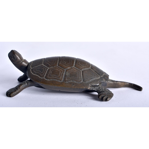 47 - A 19TH CENTURY JAPANESE MEIJI PERIOD BRONZE TORTOISE OKIMONO modelled roaming. 10 cm wide.