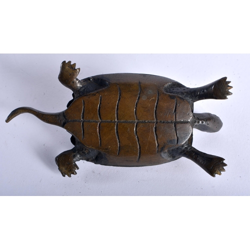 47 - A 19TH CENTURY JAPANESE MEIJI PERIOD BRONZE TORTOISE OKIMONO modelled roaming. 10 cm wide.