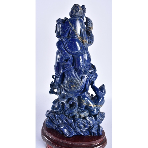 49 - A LARGE EARLY 20TH CENTURY CHINESE CARVED LAPIS LAZULI FIGURE OF A FISHERMAN Late Qing/Republic. 34 ... 