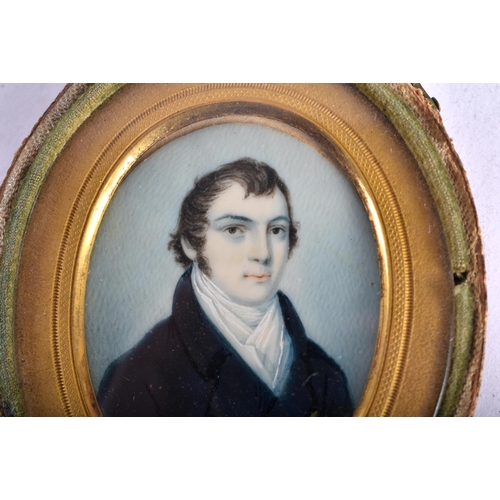 60 - English School (18th/19th Century) Portrait Miniature, Male wearing a dark blue overcoat, gilt metal... 