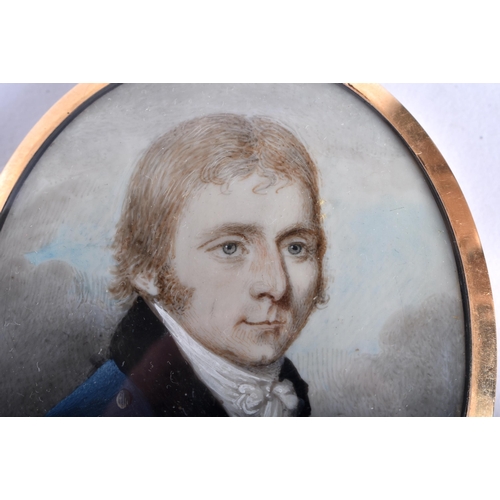 61 - Manner of Andrew Plimer (1763-1837) Portrait Miniature, Male wearing a dark blue overcoat, yellow me... 