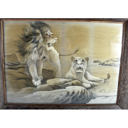 629 - A LARGE 19TH CENTURY JAPANESE MEIJI PERIOD SILK EMBROIDERED PANEL depicting two lions within a lands... 