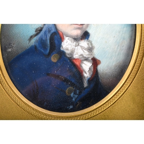 63 - English School (18th/19th Century) Portrait Miniature, Male wearing a dark blue overcoat, gilt bronz... 