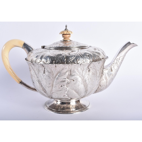 630 - A FINE ART NOUVEAU CABBAGE LEAF SILVER TEAPOT AND COVER by the Guild of Handicrafts. London 1911. 73... 