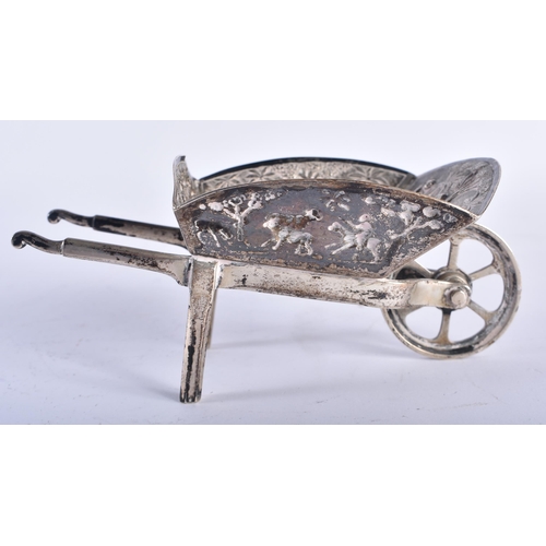 83 - AN UNUSUAL LATE 19TH CENTURY INDIAN BANGALORE SILVER NOVELTY WHEELBARROW decorated in relief with fi... 