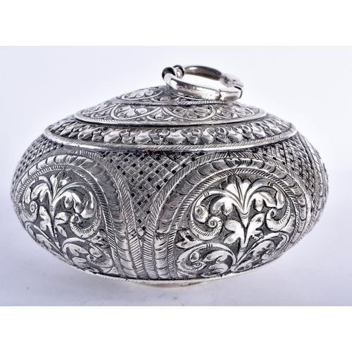 93 - A LATE 19TH CENTURY INDIAN SILVER CIRCULAR TRAVELLING INCENSE BURNER AND COVER decorated with repous... 