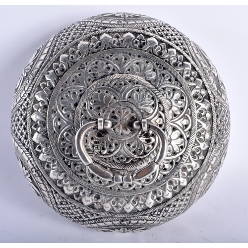 93 - A LATE 19TH CENTURY INDIAN SILVER CIRCULAR TRAVELLING INCENSE BURNER AND COVER decorated with repous... 