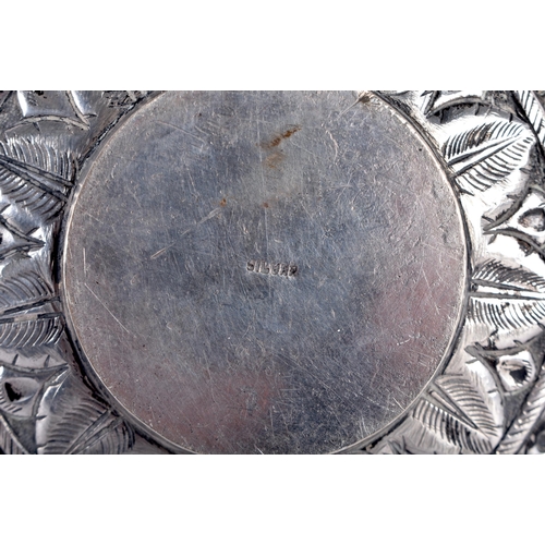 93 - A LATE 19TH CENTURY INDIAN SILVER CIRCULAR TRAVELLING INCENSE BURNER AND COVER decorated with repous... 