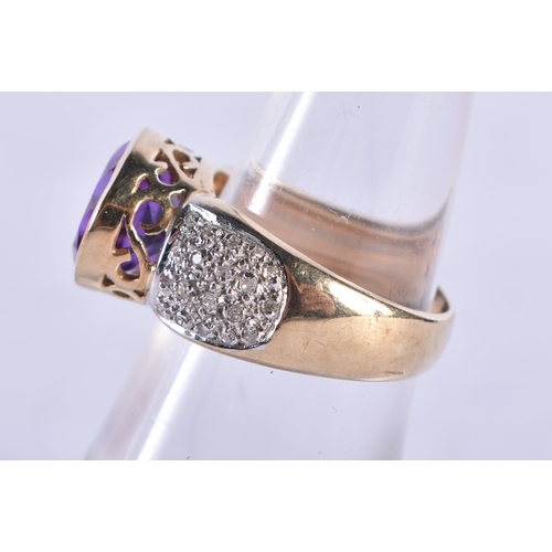 868 - An 9 Ct Gold Ring set with an Amethyst with diamond shoulder.  Size M, weight 5.61g