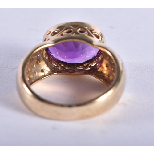 868 - An 9 Ct Gold Ring set with an Amethyst with diamond shoulder.  Size M, weight 5.61g