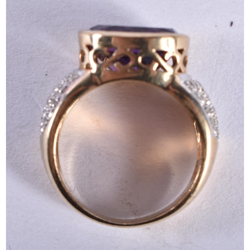 868 - An 9 Ct Gold Ring set with an Amethyst with diamond shoulder.  Size M, weight 5.61g