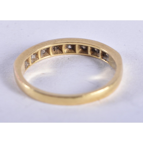 869 - An 18 Ct Gold ring set with Diamonds.  Size N, weight 2.67g