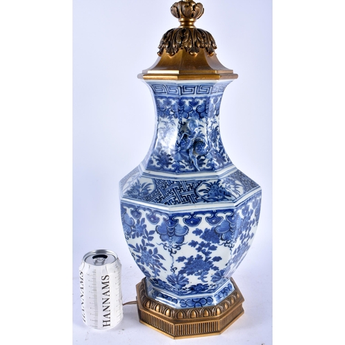 105A - A LARGE 19TH CENTURY CHINESE BLUE AND WHITE PORCELAIN COUNTRY HOUSE LAMP Qing, painted with foliage ... 