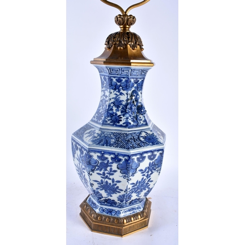 105A - A LARGE 19TH CENTURY CHINESE BLUE AND WHITE PORCELAIN COUNTRY HOUSE LAMP Qing, painted with foliage ... 