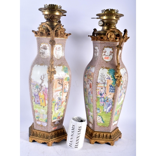 115B - A LARGE PAIR OF 18TH CENTURY CHINESE EXPORT TWIN HANDLED COUNTRY HOUSE PORCELAIN OIL LAMPS Qianlong,... 