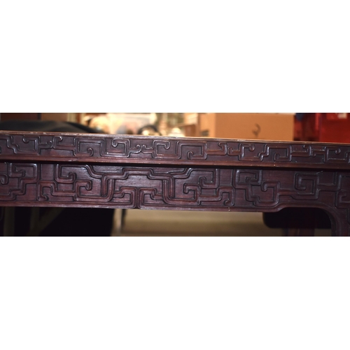 125B - A 19TH CENTURY CHINESE CARVED HARDWOOD ALTAR TABLE Qing, formed with assorted motifs. 100 cm x 34 cm... 