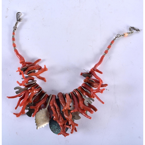 35C - AN UNUSUAL 19TH CENTURY MIDDLE EASTERN ISLAMIC STICK CORAL NECKLACE set with a central Islamic coin.... 