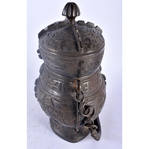 75A - A LARGE LATE 19TH CENTURY CHINESE BRONZE ARCHAIC VESSEL AND COVER Late Qing, modelled with taotie ma... 