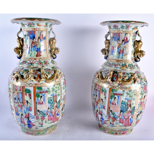 75B - A LARGE PAIR OF 19TH CENTURY CHINESE CANTON FAMILLE ROSE PORCELAIN VASES Qing, painted with figures ... 