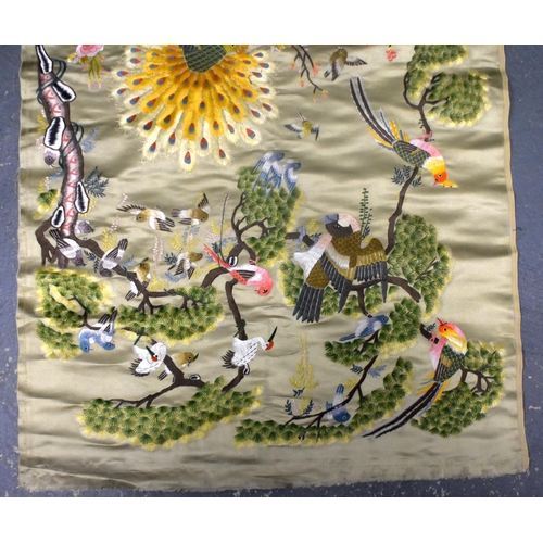 75D - AN EARLY 20TH CENTURY CHINESE SILK EMBROIDERED PANEL Late Qing/Republic, depicting birds of paradise... 