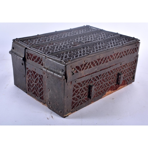 85B - A 16TH CENTURY GERMAN GOTHIC STRAP IRON WOOD STRONG BOX overlaid with foliate type panelling, with o... 