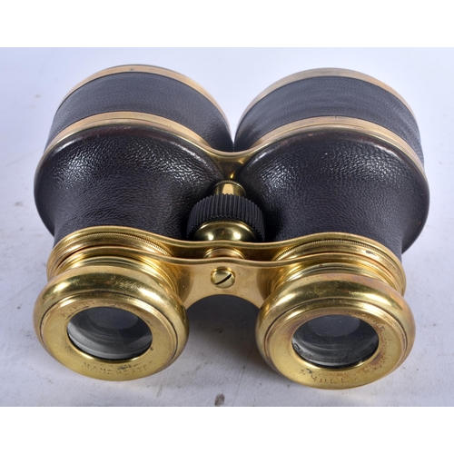 95D - A PAIR OF ANTIQUE MANCHESTER SOUTHPORT HILL BINOCULARS with leather banding. 11 cm x 10 cm.