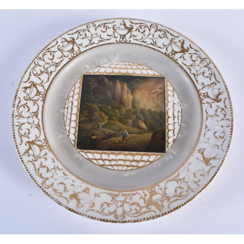 10 - A RARE EARLY 19TH CENTURY CHAMBERLAINS WORCESTER LANDSCAPE PLATE together with two similar armorial ... 