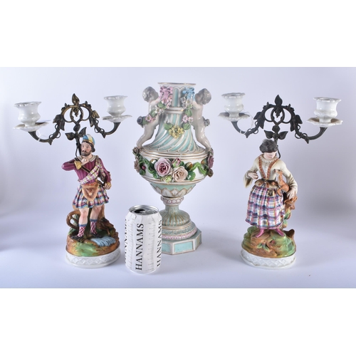 101 - A PAIR OF 19TH CENTURY FRENCH PARIS BISQUE PORCELAIN CANDLESTICKS together with a large 19th century... 