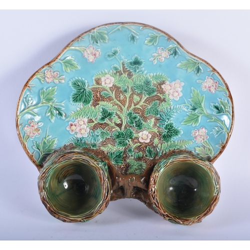 106 - A 19TH CENTURY GEORGE JONES MAJOLICA POTTERY DISH decorated in relief with fruiting vines and flower... 