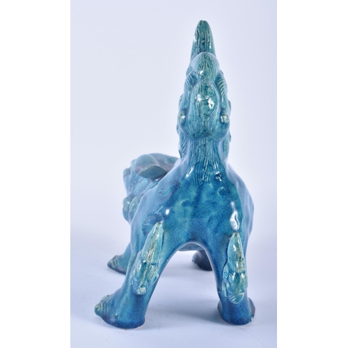 108 - A 19TH CENTURY CHINESE STYLE BLUE GLAZED FIGURE OF A BUDDHISTIC LION possibly Burmantofts. 21 cm x 1... 