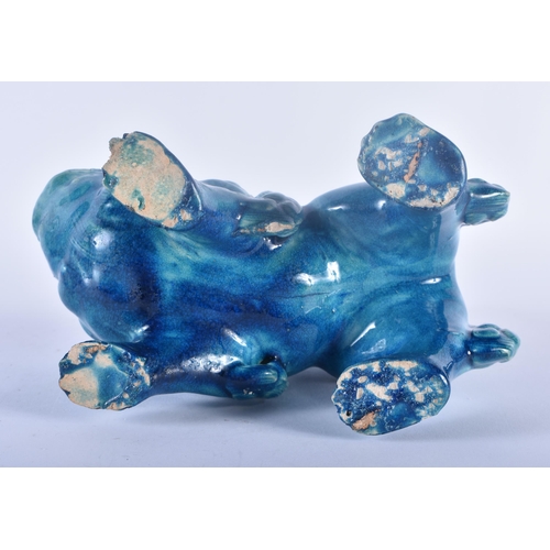 108 - A 19TH CENTURY CHINESE STYLE BLUE GLAZED FIGURE OF A BUDDHISTIC LION possibly Burmantofts. 21 cm x 1... 