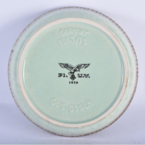 117 - AN UNUSUAL GERMAN POTTERY ASHTRAY of WWII military interest. 15 cm diameter.