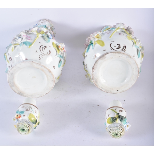 130 - A PAIR OF EARLY 19TH CENTURY ENGLISH PORCELAIN ENCRUSTED VASES AND COVERS with gilt highlights. 29 c... 