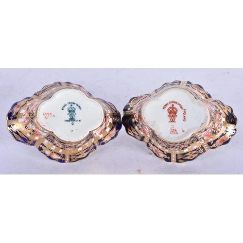 139 - A PAIR OF MINIATURE ROYAL CROWN DERBY IMARI BASKETS. 7 cm wide.